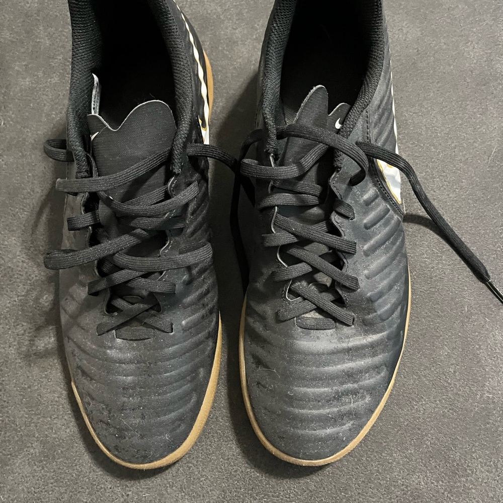 Nike soccer shoes. Run a bit small (I wear a 9). Good condition